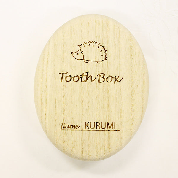 Oval-shaped baby tooth case (Hedgehog)