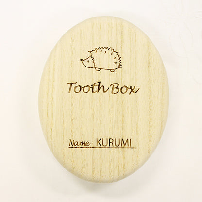 Oval-shaped baby tooth case (Hedgehog)